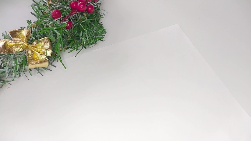 Christmas calligraphic signature of Santa Claus. Inscription on a white background by hand. Winter holiday, design of greeting cards and letters, banners and posters