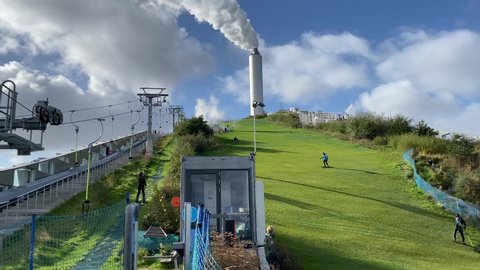 Copenhagen, Denmark - October 17 2021: The grass skiing area Copenhill on top of a waste-to-energy plant