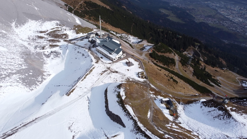 Ski Lodge In The Mountains In Innsbruck Austria - aerial shot