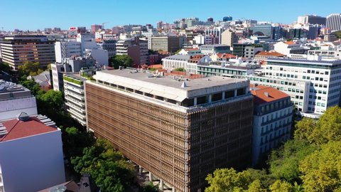 Lisbon , Portugal - 11 30 2021: Aerial view of the Novo Banco building in Lisbon, Portugal - reverse, pan, drone shot