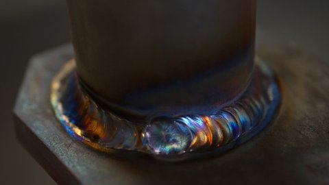 Close-Up Shot Of Hot Metal Rod Spinning On Machinery - Monterey, California