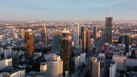 Aerial panoramic footage of downtown. Modern high rise office buildings towering above urban development. Warsaw, Poland