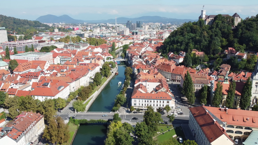 Ljubljanica river in central Ljubljana, Slovenia. Aerial shot, panoramic view.  Royalty-Free Stock Footage #1083536626