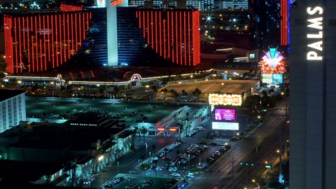  Las Vegas , United States - 12 04 2021: Time lapse of traffic on night city streets in Las Vegas, Nevada, United states