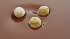 4k video of three sweets in motion in chocolate.