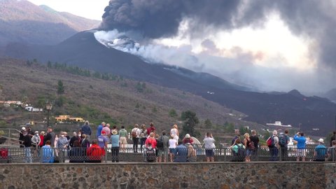 LA PALMA, SPAIN - NOVEMBER 12.2021: People looking to Cumbre Vieja volcano eruption on the Canary island of La Palma