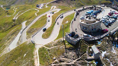 Mountain peaks of Grossglockner in summer season. Aerial view from above Edelweiss Spitze car park