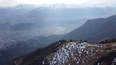 Picturesque View From The Peak Of Nordkette Mountain In Tyrol, Innsbruck, Austria On A Misty Day. aerial