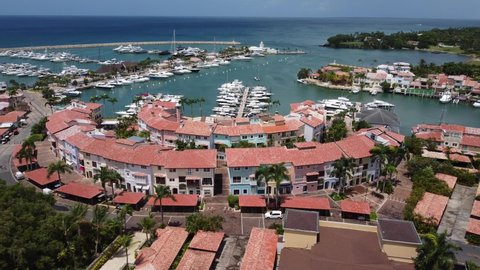 Touristic marina village at La Romana marina in Dominican Republic. Aerial forward