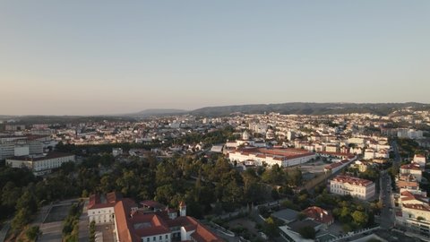 Aerial flying towards Coimbra Prision establishment Building, Cityscape Horizon