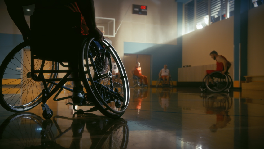 Wheelchair Basketball Game Court: Paraplegic Professional Players Competing, Passing, Shooting Ball. Determination, Inspiration, and Skill of a People with Disability. Slow Motion Royalty-Free Stock Footage #1083576688