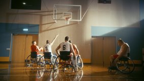 Wheelchair Basketball Game Court: Players Competing, Dribbling, Shooting it Successfully, Score Goal Points. Determination, Skill of People with Disability. Slow Motion, Handheld Following Shot - Powered by Shutterstock - Get 15% off with code: PIKWIZARD15