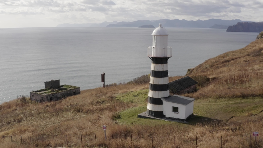 Old lighthouse at Cape Mayachny on the Pacific coast