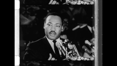 1965 Chicago, IL. Dr. Martin Luther King Jr.  speech about the cost of inequity, the difference between the upper and lower social class during the Chicago Freedom Movement. 4K Overscan of Newsreel