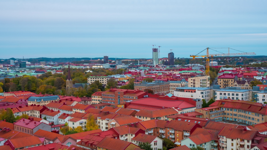 Gothenburg, Sweden. Aerial view of the city center of Gothenburg, Sweden during the sunset from evening to night. Historical buildings with blue sky. Time-lapse with car traffic, zoom in