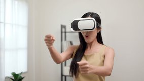 Young asian woman put on vr glasses into virtual simulated world metaverse and driving car. Future technology digital cyber universe. Person Enjoying an Experiences of Metaverse Virtual World.