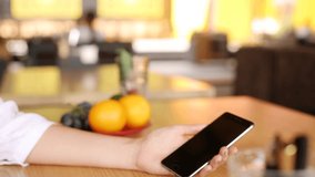 Female scanning fingerprint on her smartphone for secure login and privacy. Woman unlocks mobile phone with biometric sensor and finger. Female tunes finger print unlock feature on her phone. - Powered by Shutterstock - Get 15% off with code: PIKWIZARD15