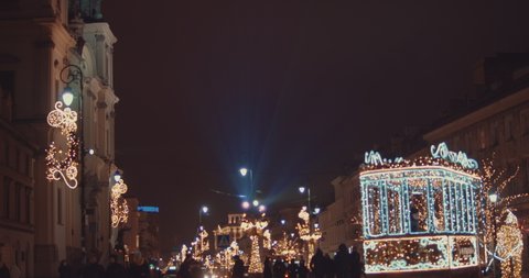 Illumination Christmas decorations, garlands and lights in night city square Night Street, Trees At The Sidewalk. Light Illumination. 