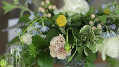 Slider shot of a centerpiece floral arrangement.