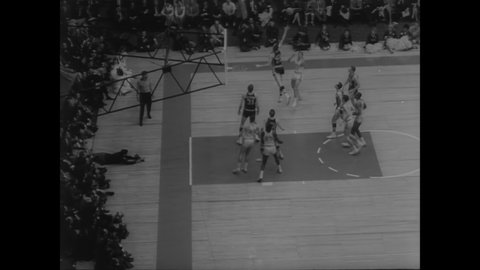 CIRCA 1964 - The UCLA Bruins take on the Duke Blue Devils for the NCAA basketball championship.