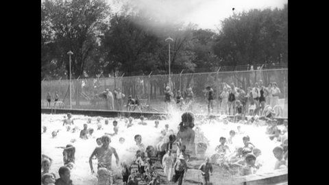 CIRCA 1936 - Underprivileged children attend summer camp and preschool at institutions helmed by the WPA in Minnesota.