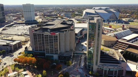 ATLANTA, GEORGIA - CIRCA 2020s - Aerial of CNN headquarters in Atlanta, Georgia, corporate center of the cable news network.