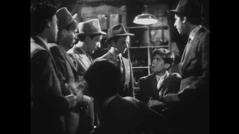 CIRCA 1938 - In this crime movie, teenagers set fire to an apartment after being extorted by the landlord.