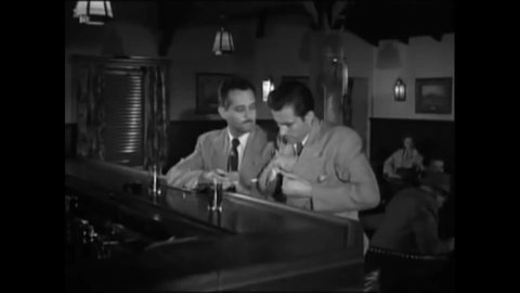 CIRCA 1954 - In this crime movie, cops harass suspects at a bar.