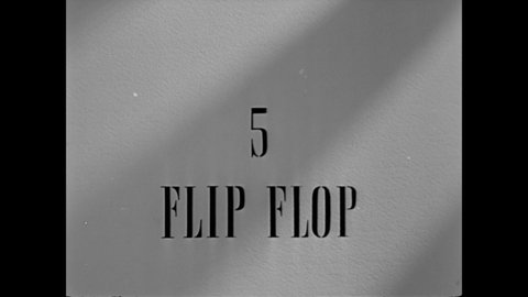 CIRCA 1944 - A US Navy WAVE demonstrates the different positions of the flip flop exercise.