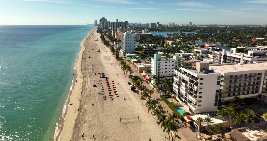 Hollywood Beach oceanwalk boardwalk pathway by the sand. 5k drone footage