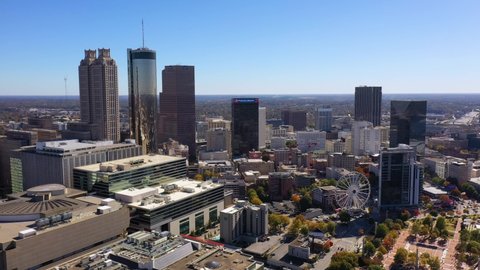 ATLANTA, GEORGIA - CIRCA 2020s - Very good establishing aerial of downtown business district Atlanta Georgia.