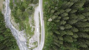 Drone video of road, forest, river, mountains, cars and more.
