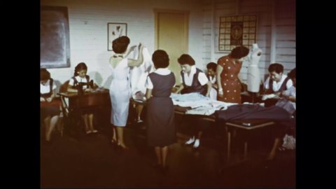 CIRCA 1960s - Women learn the art of fashion design in Guatemala.