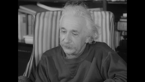 CIRCA 1946 - Albert Einstein listens intently at a meeting of America's Committee on Atomic Information.