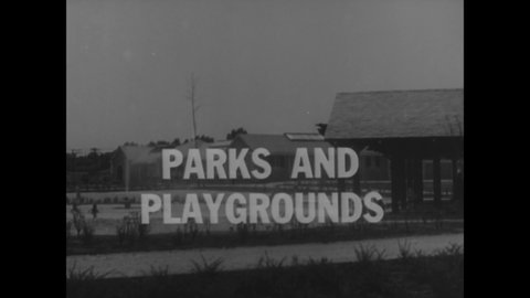 CIRCA 1936 - Children enjoy swimming pools and playgrounds across Chicago.
