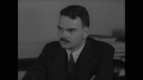 CIRCA 1937 - New York's deputy district attorney Thomas Dewey assures his chief assistants that witnesses against the mob will be protected.