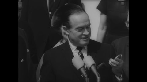 CIRCA 1963 - Bob Hope gives a humorous speech after receiving a special Congressional gold medal from JFK.