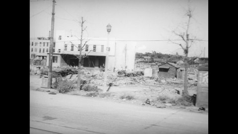 CIRCA 1945 - Drive through a war-torn Japanese city.