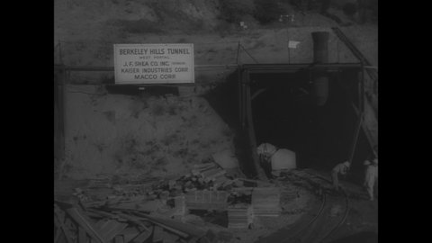 CIRCA 1966 - Construction workers dig the Berkeley Hills Tunnel in California.