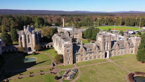 ROME, GEORGIA - CIRCA 2020s - Beautiful aerial establishing shot of Berry College, a classical Gothic English or British style college campus.