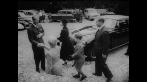 CIRCA 1957 - Queen Elizabeth II and Prince Philip drop off Prince Charles at Cheam School.