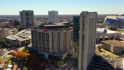 ATLANTA, GEORGIA - CIRCA 2020s - Aerial of CNN headquarters in Atlanta, Georgia, corporate center of the cable news network.