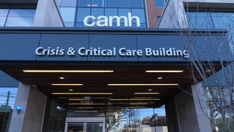 TORONTO, ONTARIO, CANADA - Nov 10th, 2021: Exterior and entrance to the CAMH Crisis and Critical Care Building. CAMH is a psychiatric teaching hospital located in Toronto.