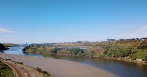 Flight above Patea River and wastewater oxidation ponds -Spring New Zealand