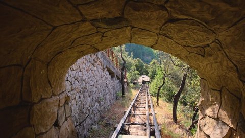 Lebanese Funicular Train Moving Outwards Tunnel At Zahlan Grotto In Syr El Danniyeh, Lebanon. POV