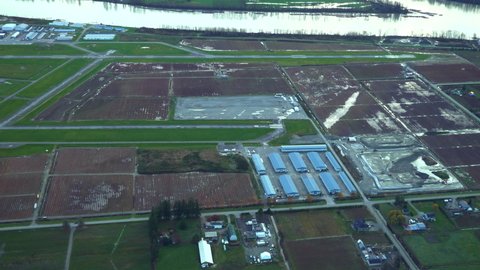 Pitt Meadows Airfield next Fraser River, Rainy Weather, Plane View.