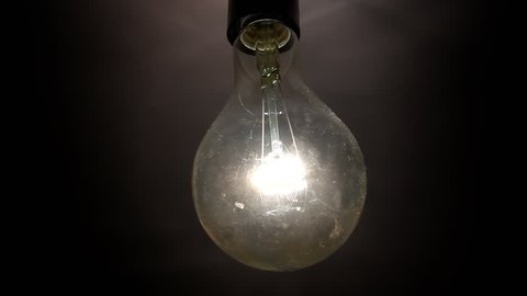 Light bulb blinks Stock Video