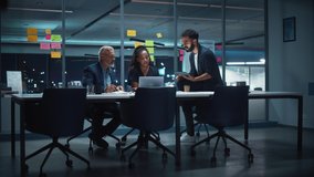 Office Conference Room Meeting: Diverse Team of Top Managers Talk, Discuss, Brainstorm, Use Laptop Computer. Business Partners Presenting Investment and Marketing Strategy for E-Commerce Startup. - Powered by Shutterstock - Get 15% off with code: PIKWIZARD15