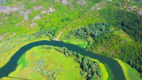 Aerial top view of River Rijeka Crnojevica in Montenegro. Skadarsko Jezero national park.