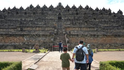 Magelang - December, 2021 : Borobudur is a Mahayana Buddhist temple in Magelang Regency. It is the world's largest Buddhist temple. The temple consists of nine stacked platforms, six square. 